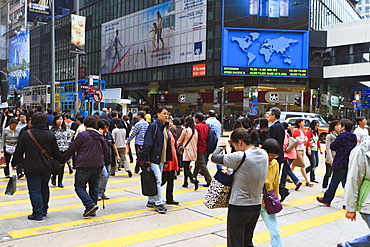 Busy crossing in Central, Hong Kong Island, Hong Kong, China, Asia