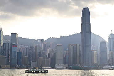 Star ferry on Victoria Harbour with the skyscrapers of Hong Kong Island behind, Hong Kong, China, Asia