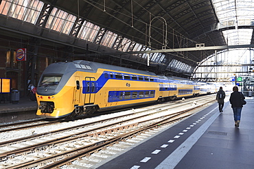 Intercity train in a platform at Central Station, Amsterdam, Netherlands, Europe 