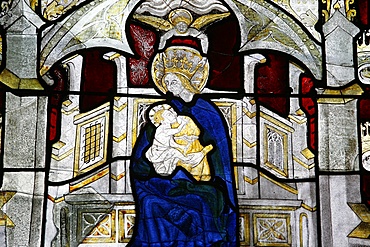 Stained glass window of the Virgin and Child at Collegiale Notre-Dame des Marais, Villefranche-sur-Saone, Rhones-Alpes, France, Europe