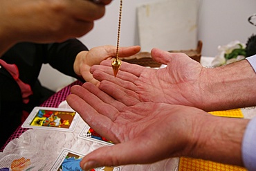 Fortuneteller conducting a divination, Paris, France, Europe