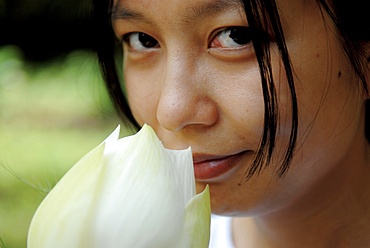 Woman with lotus flower, Vietnam, Indochina, Southeast Asia, Asia