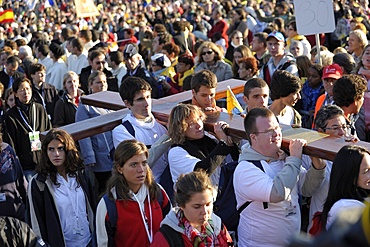 Youth carrying World Youth Days cross during the Pope's visit to Lourdes, Hautes Pyrenees, France, Europe