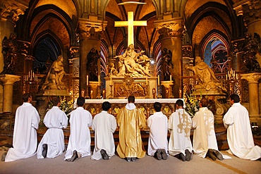 Eucharist adoration in Notre Dame de Paris cathedral, Paris, France, Europe