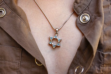 A 10-year-old girl wearing Star of David jewelry, Hertzliya, Israel, Middle East