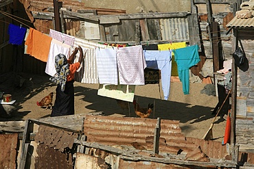 Woman drying laundry, St. Louis, Senegal, West Africa, Africa