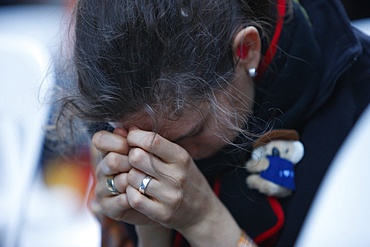 Catholic in prayer, World Youth Day, Sydney, New South Wales, Australia, Pacific