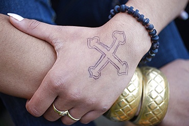 Young Catholic girl  with a tattoo, Sydney, New South Wales, Australia, Pacific