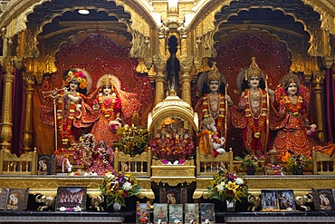 From left to right, statues of Krishna, Rada, Rama, with Hanuman in front, Sita and Laxmi, Bhaktivedanta Manor temple, Watford, Hertfordshire, England, United Kingdom, Europe