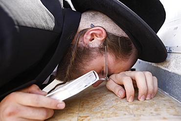 Belz Hasidic Jews praying at Maimonides' tomb in Tiberias, Galilee, Israel, Middle East