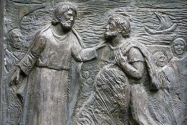 Sculpture of the calling of St. Peter on the Notre Dame door, Saint-Pierre de Montmartre church, Paris, France, Europe