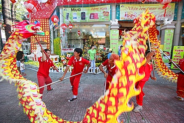 Dragon dance performers, Chinese New Year, Ho Chi Minh City, Vietnam, Indochina, Southeast Asia, Asia