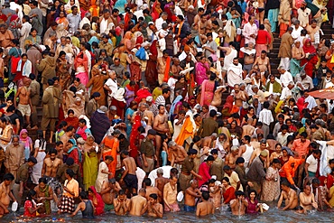 Thousands of devotees converge to take a dip in the River Ganges at Navsamvatsar, a Hindu holiday during the Maha Kumbh Mela festival, Haridwar, Uttarakhand, India, Asia