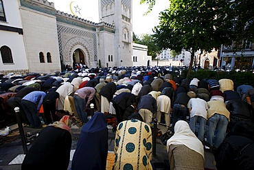 Muslims praying outside the Paris Great Mosque on Aid El-Fitr festival, Paris, France, Europe