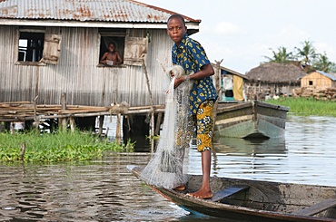 Fishing in Ganvie lake village on Nokoue Lake, Benin, West Africa, Africa