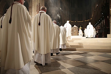 Priests' procession in Notre-Dame de Paris cathedral, Paris, France, Europe