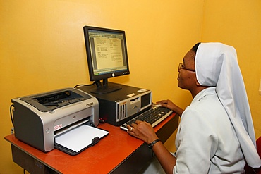 Catholic nun using internet, Lome, Togo, West Africa, Africa