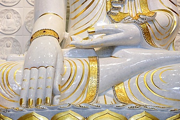 Detail of Buddha sitting in bhumisparsha-mudra posture (calling the earth to witness), Fo Guang Shan Temple, the largest Buddhist temple in Europe, Bussy-Saint-Georges, Seine-et-Marne, France, Europe