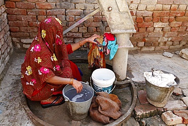 Woman doing laundry, Mathura, Uttar Pradesh, India, Asia