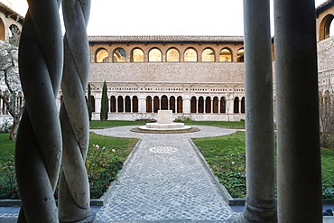 Twisted columns of  marble in the Vassaletto cloisters in the Papal Arch basilica of St. John Lateran, Rome, Lazio, Italy, Europe