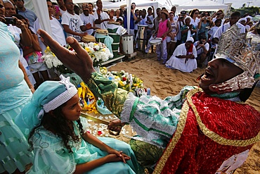 Entranced devotee embodying orixa (orisha) Oxosse during Lemnaja festival on Rio Vermelho beach, Salvador, Bahia, Brazil, South America