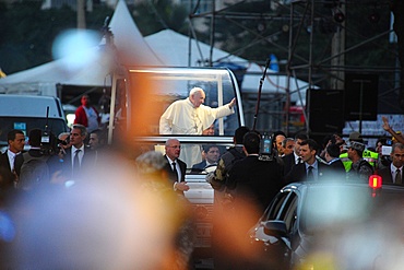 Pope Francis waves to the crowd while riding in the Popemobile, World Youth Day 2013, Rio de Janeiro, Brazil, South America