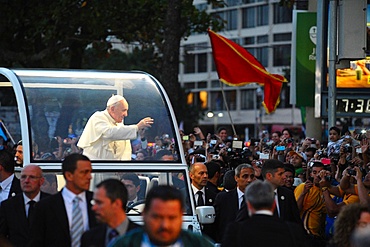 Pope Francis waves to the crowd while riding in the Popemobile, World Youth Day 2013, Rio de Janeiro, Brazil, South America