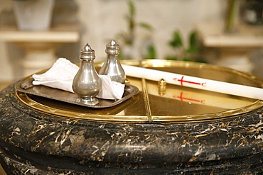 Baptistery, altar candle and chrism for the Baptism, Villemomble, Seine-Saint-Denis, France, Europe