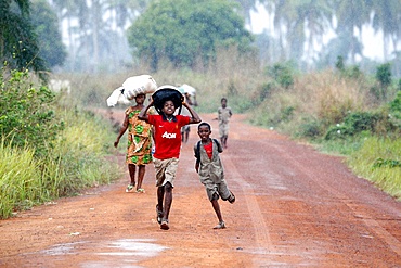 Children in the rain, Togoville, Togo, West Africa, Africa