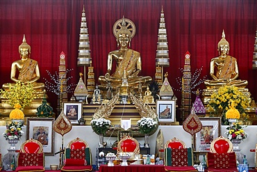 Buddha statues on main altar, Wat Velouvanaram, Bussy St. George, Seine et Marne, France, Europe