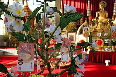 Offerings on a tree, Wat Velouvanaram, Bussy St. George, Seine et Marne, France, Europe