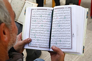 Palestinians reading the Koran outside Al-Aqsa mosque, Jerusalem, Israel, Middle East