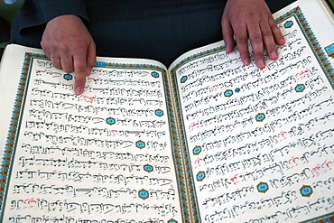 Imam reading the Quran in a mosque, Seine-e-Marne, France, Europe