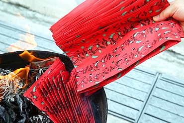 Ancestor worship, burning hell bank notes and other forms of joss paper, Hungry Ghost Festival (Ullambana), Singapore, Southeast Asia, Asia