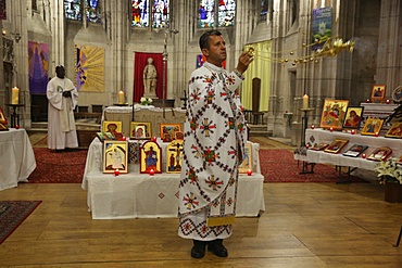 Mass celebrated by Melkite (Greek-Catholic) and Catholic priests in Sainte Foy Church, Conches, Eure, France, Europe