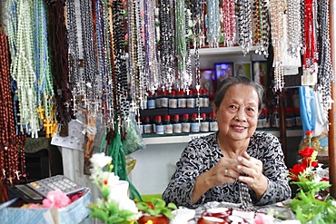 Shop selling religious Christian items including Rosary prayer beads, Ho Chi Minh City, Vietnam, Indochina, Southeast Asia, Asia