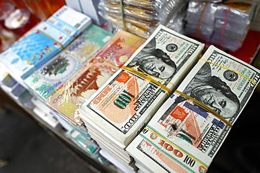 A shop selling Buddhist offerings for the temples, hell bank notes and other forms of joss paper, Ho Chi Minh City, Vietnam, Indochina, Southeast Asia, Asia