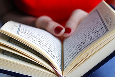 Close-up of a woman reading the Quran, Vietnam, Indochina, Southeast Asia, Asia