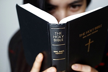 Christian woman reading the Holy Bible, Vietnam, Indochina, Southeast Asia, Asia