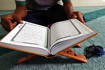 Muslim reading the Quran in Mosque, Ho Chi Minh City, Vietnam, Indochina, Southeast Asia, Asia