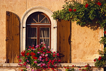 Window with shutters and window box, Italy, Europe