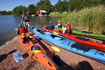 Canoeing along the coasts of the Kobba Klintar island in the Aland archipelago, Finland, Scandinavia, Europe