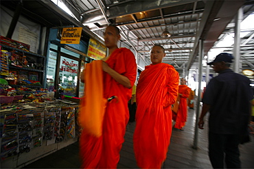 Monks walking at the market in Bangkok, Thailand, Southeast Asia, Asia