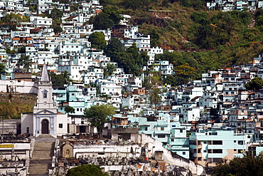 Some favellas painted with the symbolic colors of the gang reigning there, Brazil, South America