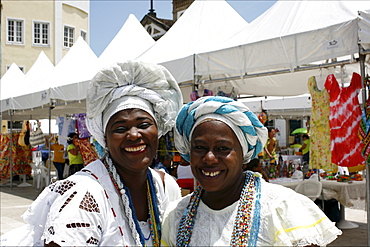 Some ladies in traditional costume in the center of Salvador de Bahia, Brazil, South America