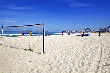 Walking on Copacabana beach in Rio de Janeiro, Brazil, South America