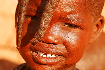 Himba child  in a village close to Kunene river,on the border between Angola and Namibia, Namibia, Africa