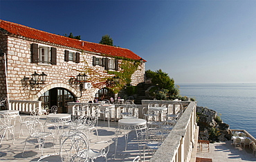 Terrace of the restaurant on the island hotel of Sveti Stefan, Montenegro, Europe