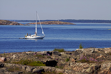 Sailing along the coast of the Kobba Klintar island in the Aland archipelago, Finland, Scandinavia, Europe