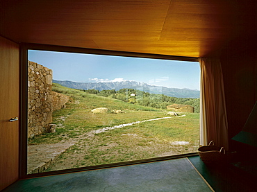 Residential interior with large glass picture window showing the landscape, La Vera, Extremadura, Spain, Europe